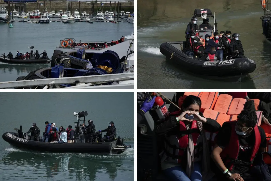 Migranti, donne e bambini portati a terra a Dover dopo aver attraversato il Canale della Manica