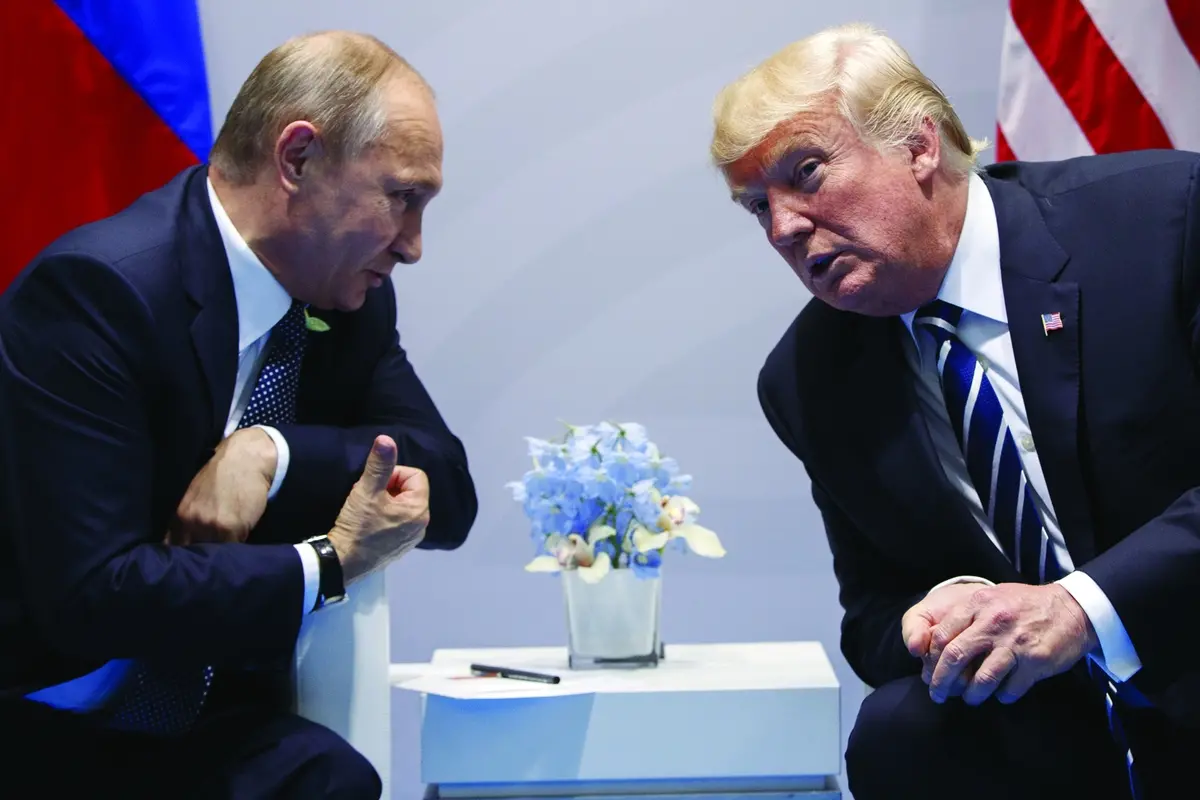 FILE - U.S. President Donald Trump meets with Russian President Vladimir Putin at the G-20 Summit in Hamburg, Germany, on July 7, 2017. Putin and President Donald Trump meet for the first time at a summit in Helsinki. Trump, asked about allegations that Russia had interfered in the 2016 election that brought him to power, dismissed the claims and said Putin was \"extremely strong and powerful in his denial.\" (AP Photo/Evan Vucci, File) , AP