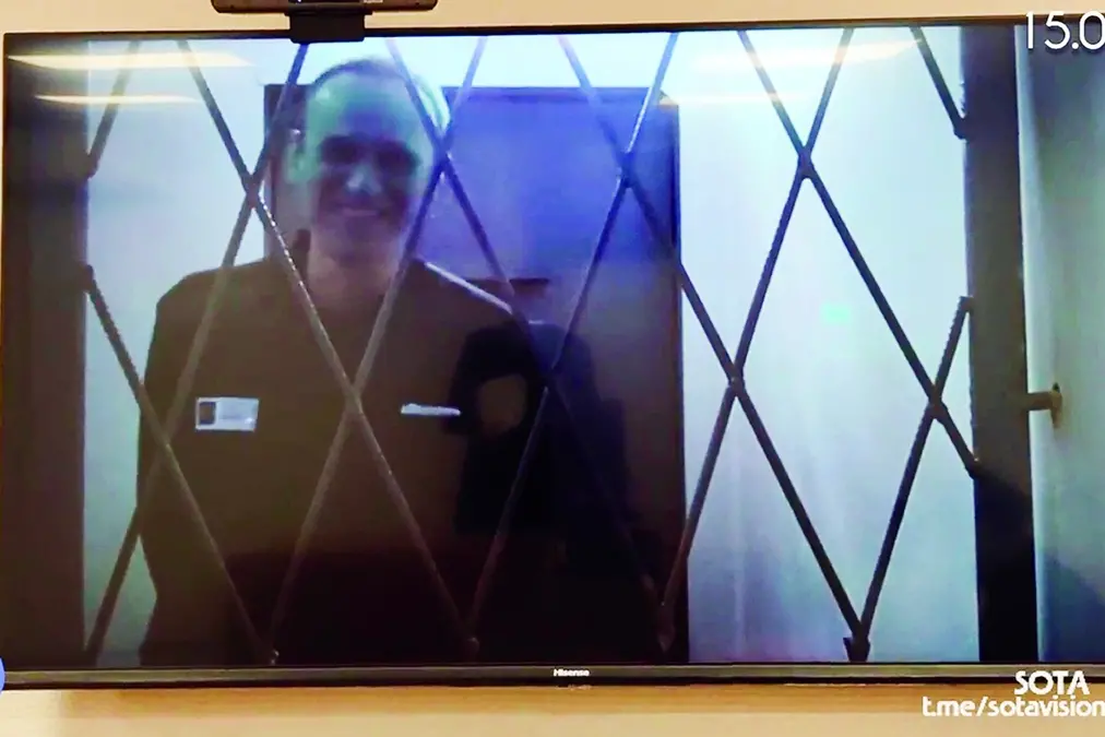 CORRECTS DATE TO FEBRUARY 14 - This photo taken from video released by Russian Federal Penitentiary Service via SOTAVISION shows Russian opposition leader Alexei Navalny appears via a video link from the Arctic penal colony in Kharp, in the Yamalo-Nenetsk region about 1,900 kilometers (1,200 miles) northeast of Moscow, where he is serving a 19-year sentence, in Kovrov, Russia, on Feb. 15, 2024. Shortly after Navalny\\'s death was reported on Friday Feb. 16, 2024, the Russian SOTA social media channel shared images of the opposition politician reportedly in court yesterday. In the footage, Navalny is seen standing up and is laughing and joking with the judge via video link. (Russian Federal Penitentiary Service via SOTAVISION via AP) , Associated Press/LaPresse