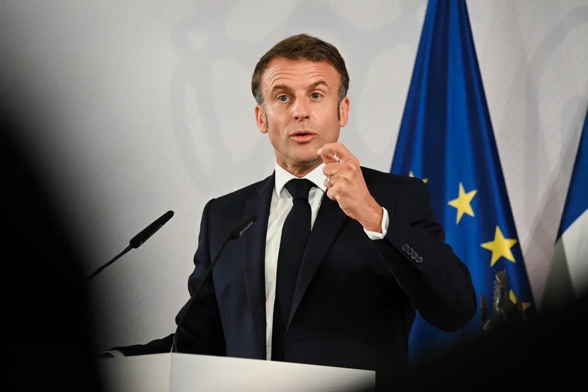 French President Emmanuel Macron speaks as he is presented with the International Award of the Peace of Westphalia, in Muenster, Germany, Tuesday May 28, 2024. (Jana Rodenbusch/Pool Photo via AP) , APN