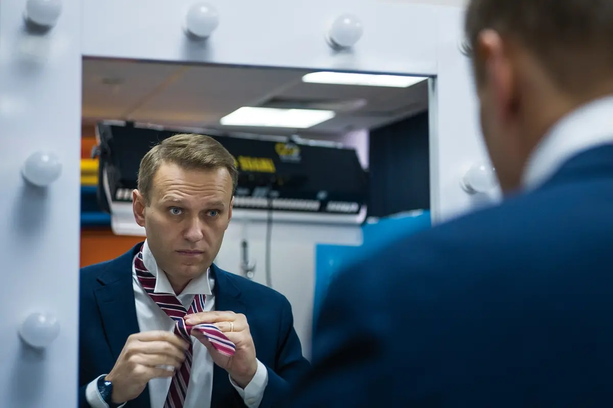 FILE - Russian opposition politician Alexei Navalny prepares himself prior his interview with The Associated Press in Moscow, Russia on Dec. 18, 2017. Alexei Navalny, the fiercest foe of Russian President Vladimir Putin who crusaded against official corruption and staged massive anti-Kremlin protests, died in prison Friday Feb. 16, 2024 Russia\\u2019s prison agency said. He was 47. (AP Photo/Alexander Zemlianichenko, File) , AP