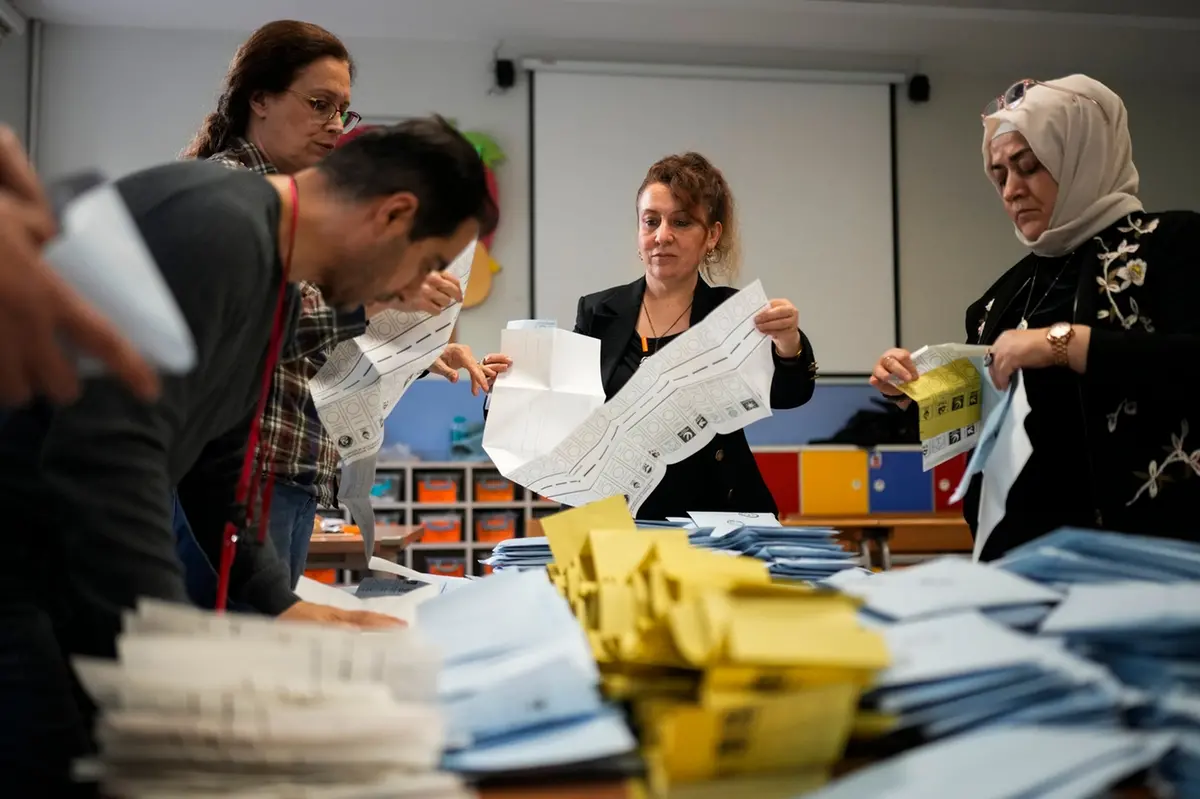 Election representatives count the ballots at a polling station in Istanbul, Turkey, Sunday, March 31, 2024. Turkey is holding local elections on Sunday that will decide who gets to control Istanbul and other key cities. (AP Photo/Emrah Gurel)