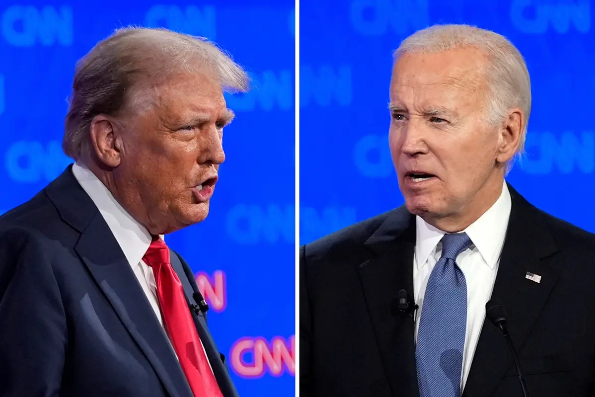 Donald Trump e Joe Biden durante il confronto alla CNN , APN