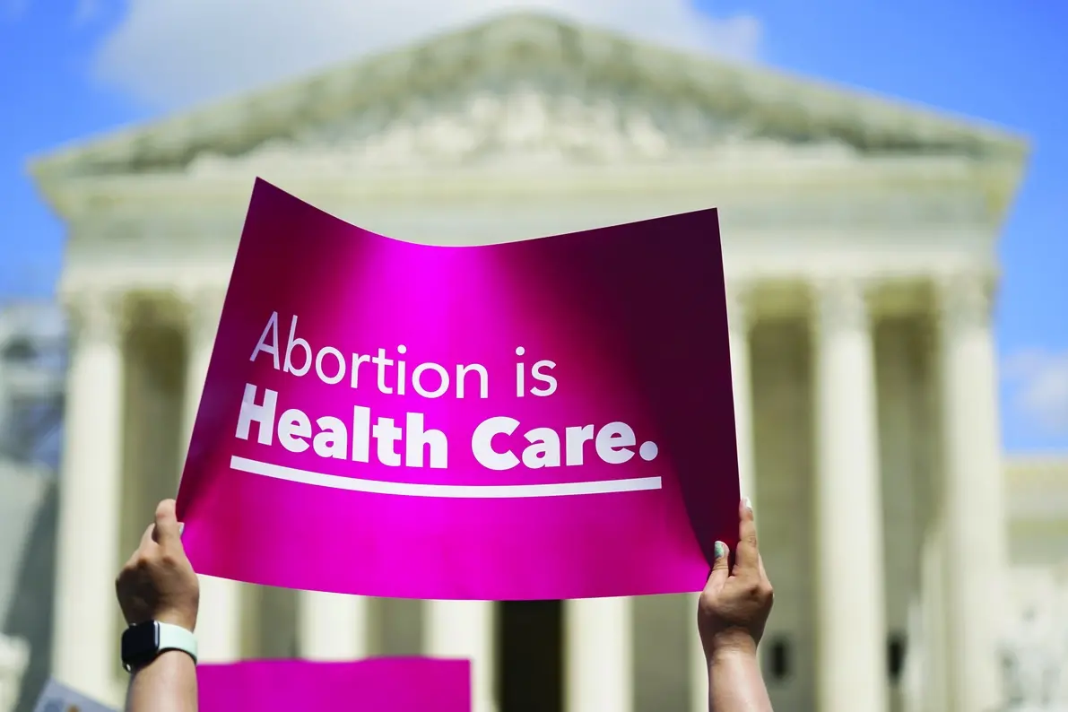 Demonstrators hold signs as they rally outside the Supreme Court building during the Women\\'s March in Washington, Saturday, June 24, 2023. Abortion rights and anti-abortion activists held rallies Saturday in Washington and across the country to call attention to the Dobbs v. Jackson Women\\u2019s Health Organization ruling on June 24, 2022, which upended the 1973 Roe v. Wade decision. (AP Photo/Stephanie Scarbrough) Associated Press/LaPresse Only Italy and Spain , APN