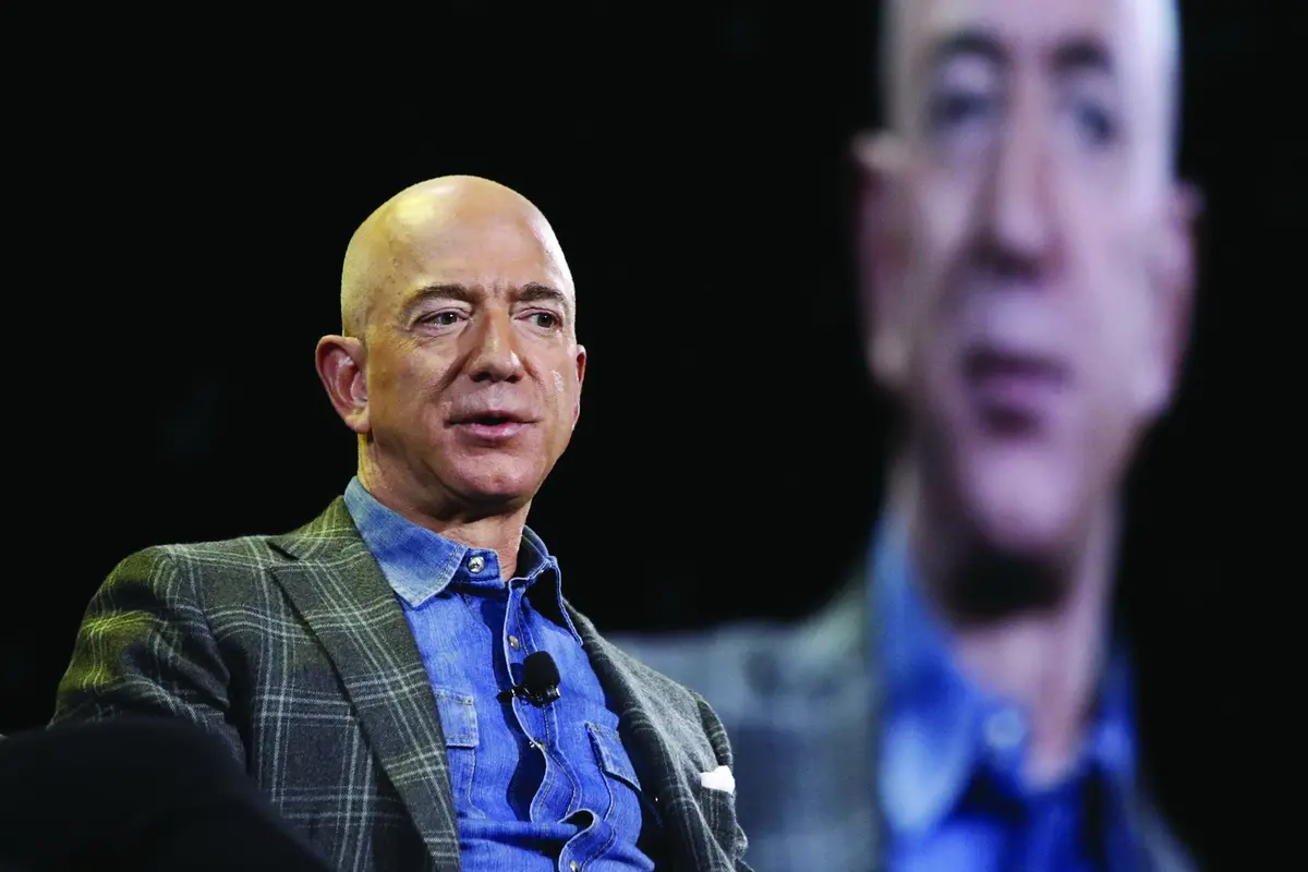 FILE - Amazon CEO Jeff Bezos speaks at the Amazon re:MARS convention in Las Vegas on June 6, 2019. Most news organizations hold its journalists to strict ethical standards to avoid conflicts of interest either real or perceived. Is the same true for its bosses? (AP Photo/John Locher, File) , AP