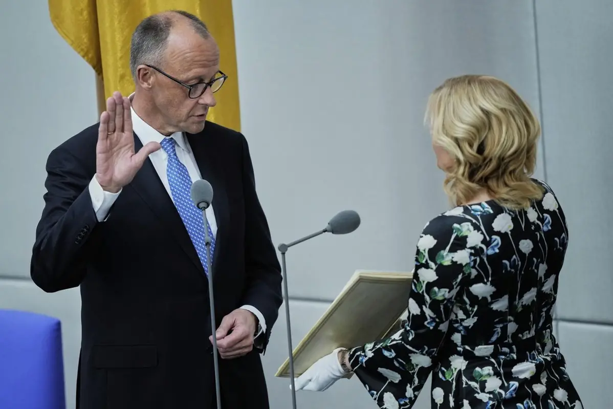 Friedrich Merz takes the oath of office in front of Parliament President Julia Kloeckner after being elected new Chancellor at the German federal parliament, Bundestag, at the Reichstag building in Berlin, Germany, Tuesday, May 6, 2025..(AP Photo/Ebrahim Noroozi) Associated Press / LaPresse Only italy and spain , APN