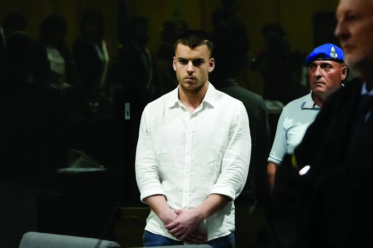 FILE - Gabriel Natale-Hjorth, centre, attends a hearing for the appeals trial in Rome, on July 3, 2024. Natale-Hjorth, one of the two Americans convicted in the 2019 stabbing death of a carabiniere police officer in Rome has been granted house arrest after an appeals court significantly reduced his original life sentence. (AP Photo/Alessandra Tarantino, File) , Associated Press/LaPresse