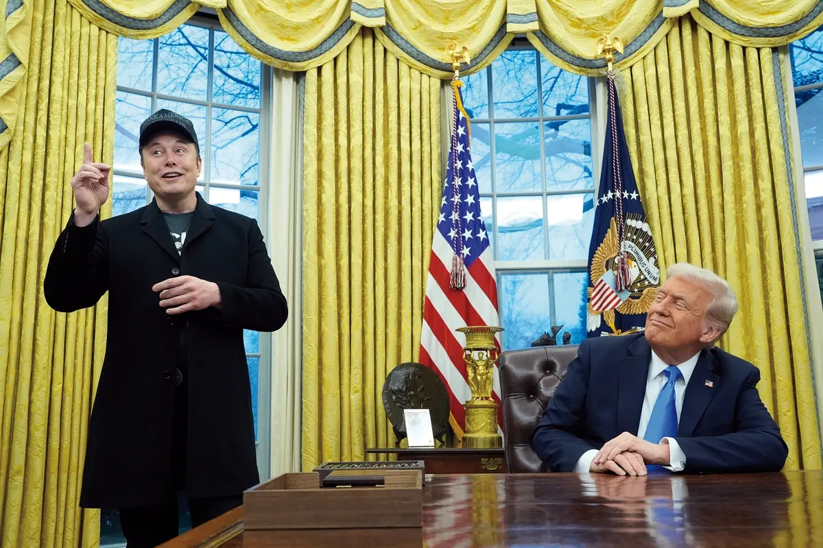 President Donald Trump listens as Elon Musk speaks in the Oval Office at the White House, Tuesday, Feb. 11, 2025, in Washington. (Photo/Alex Brandon)