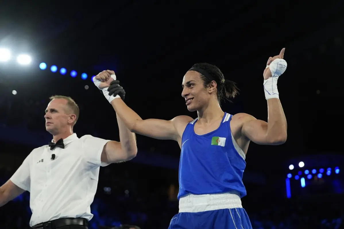 Algeria\\\\\\'s Imane Khelif celebrates after defeating Thailand\\\\\\'s Janjaem Suwannapheng in their women\\\\\\'s 66 kg semifinal boxing match at the 2024 Summer Olympics, Tuesday, Aug. 6, 2024, in Paris, France. (AP Photo/John Locher) , APS