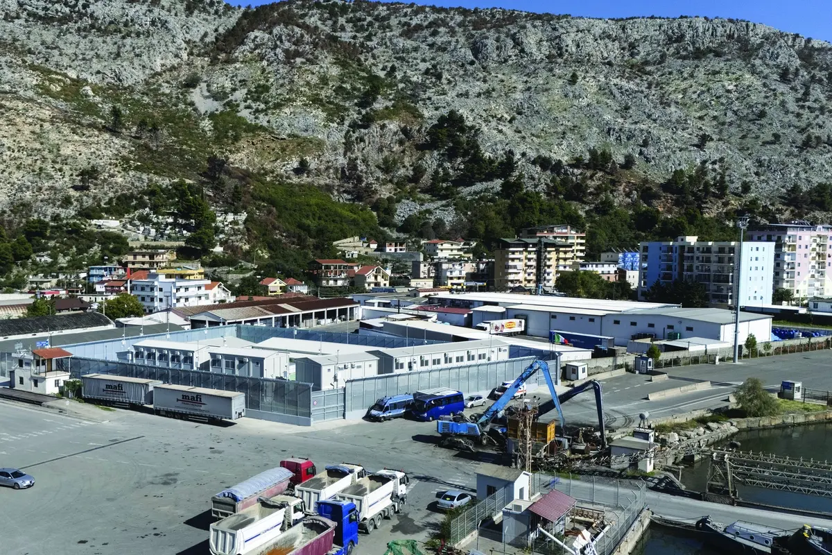 A general view of a migrant processing center at the port of Shengjin, northwestern Albania Wednesday, Oct. 16, 2024, as the first group of migrants who were intercepted in international waters arrived Wednesday. (AP Photo/Vlasov Sulaj) Associated Press / LaPresse Only italy and spain , Associated Press / LaPresse