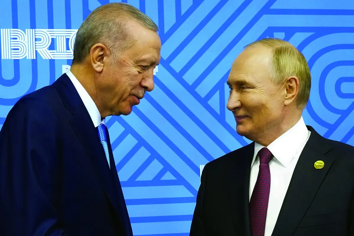 Russian President Vladimir Putin, right, meets with Turkish President Recep Tayyip Erdogan on the sidelines of the BRICS summit in Kazan, Russia, Wednesday, Oct. 23, 2024. (AP Photo/Alexander Zemlianichenko, Pool) , APN