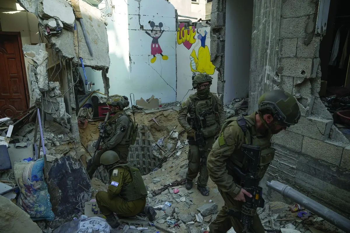 Israeli soldiers stand at the entrance of a tunnel where the military says six Israeli hostages were recently killed by Hamas militants, in the southern Gaza Strip on Friday, Sept. 13, 2024. (AP Photo/Leo Correa) Associated Press/LaPresse , APN