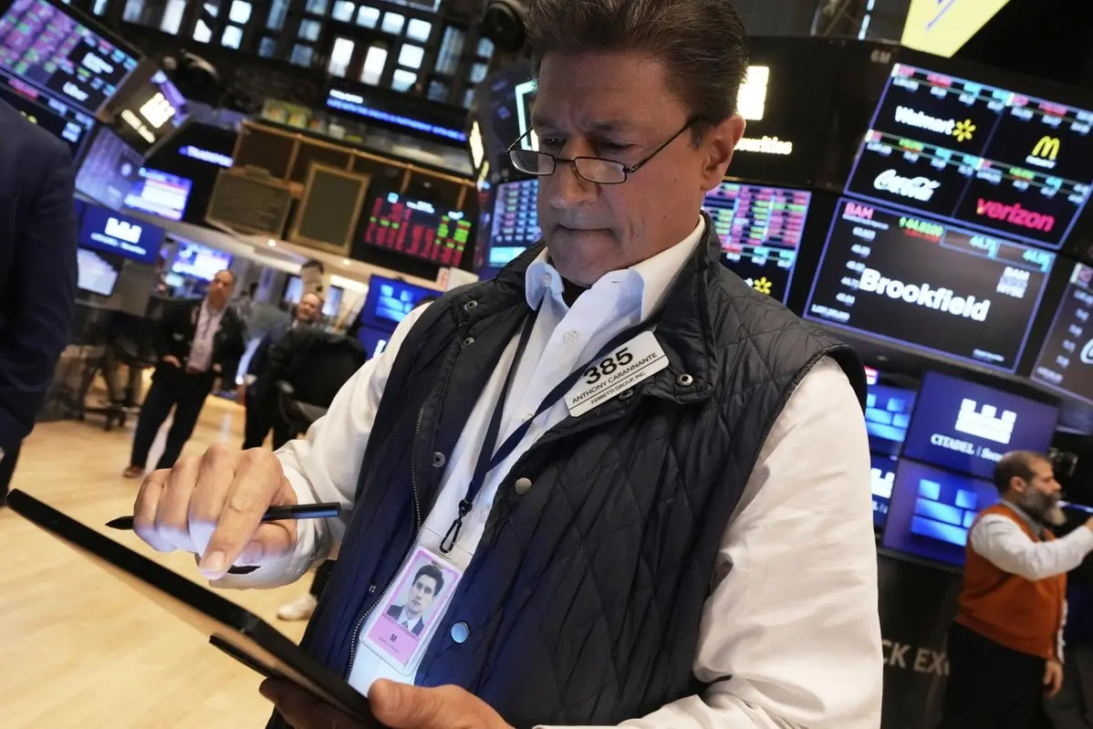 Trader Anthony Carannante works on the floor of the New York Stock Exchange, Friday, April 4, 2025. (AP Photo/Richard Drew) , APN