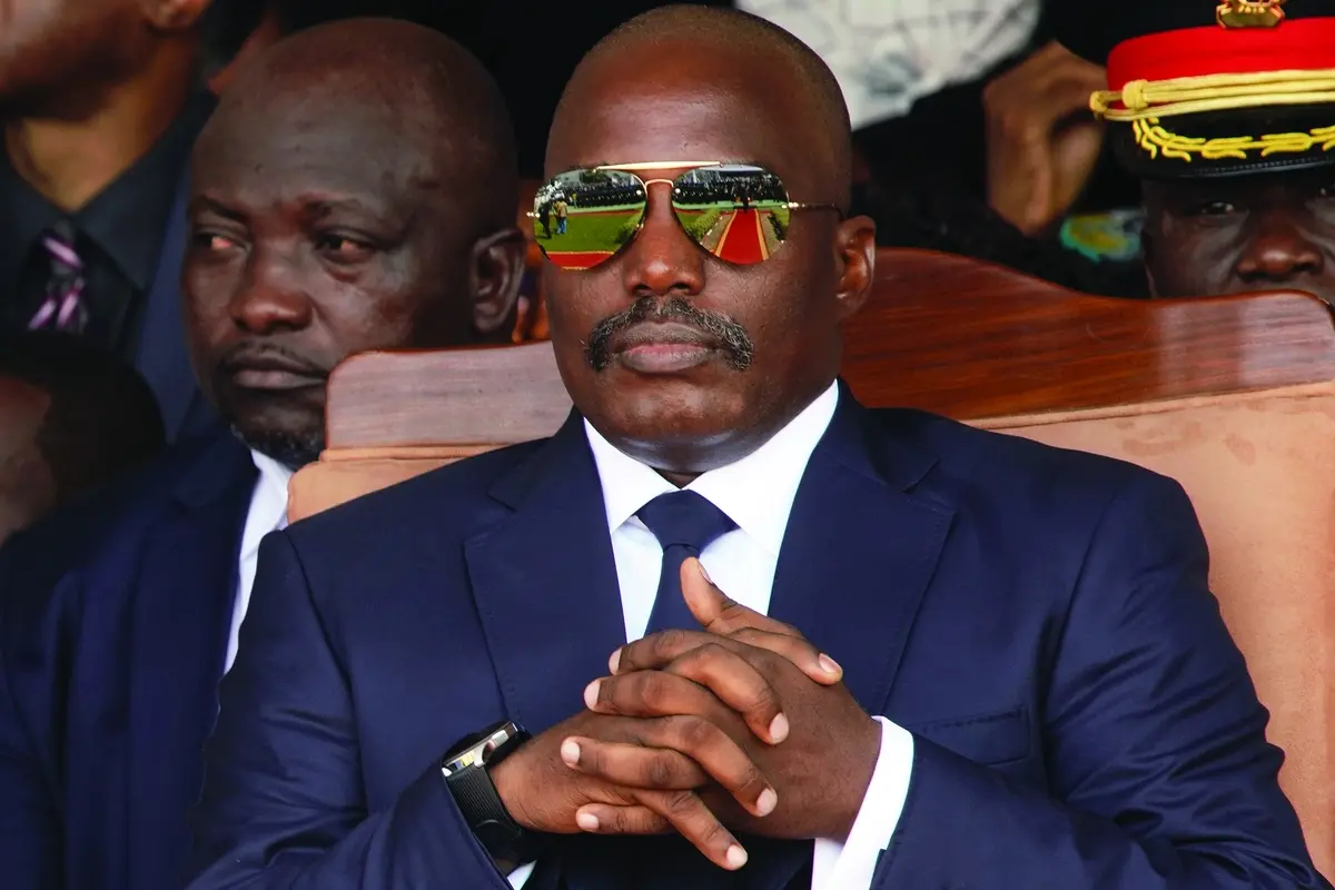 Outgoing president Joseph Kabila sits during the inauguration ceremony for Congolese President Felix Tshisekedi in Kinshasa, Democratic Republic of the Congo, Thursday Jan. 24, 2019. (AP Photo/Jerome Delay, File) , AP