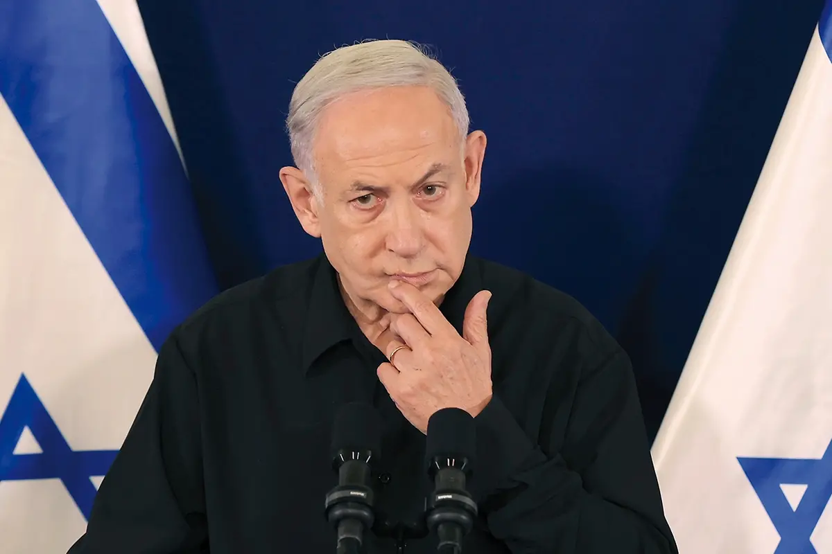 Israeli Prime Minister Benjamin Netanyahu speaks during a press conference with Defense Minister Yoav Gallant and Cabinet Minister Benny Gantz in the Kirya military base in Tel Aviv, Israel, Saturday, Oct. 28, 2023. (Abir Sultan/Pool Photo via AP) , AP