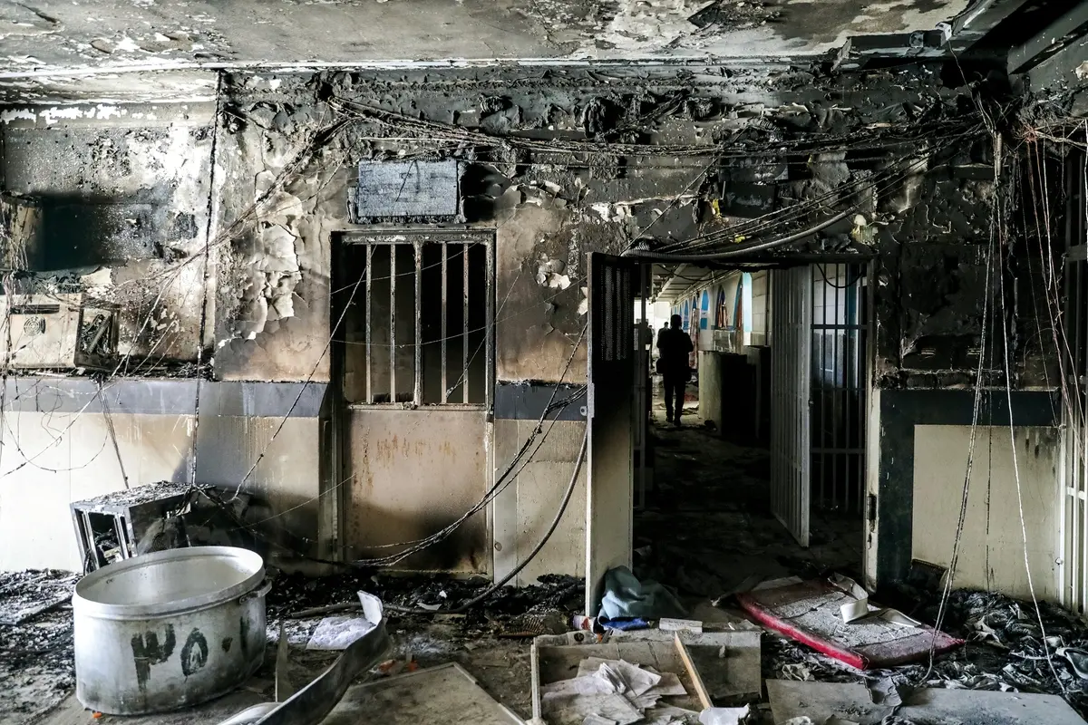 This photo released by Mizan News Agency, shows a workshop of Evin prison following a fire in Tehran, Iran, Sunday, Oct. 16, 2022. A towering blaze at the prison housing political prisoners and anti-government activists killed four inmates, the country\\'s judiciary said. (Koosha Mahshid Falahi/Mizan News Agency via AP) , AP
