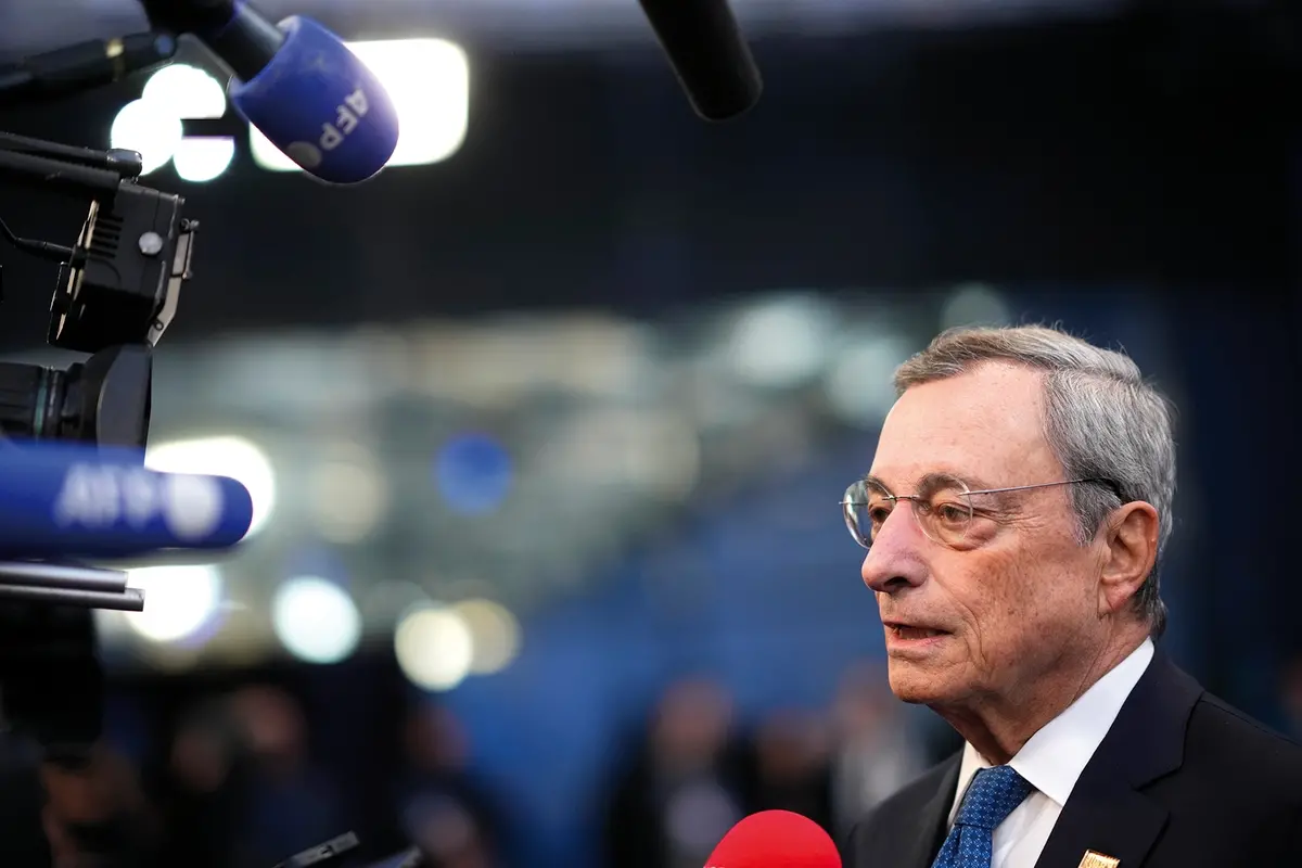 Former Central Bank President Mario Draghi speaks with the media as he arrives for an EU Summit at the Puskas Arena in Budapest, Hungary, Friday, Nov. 8, 2024. (AP Photo/Petr David Josek) , APN