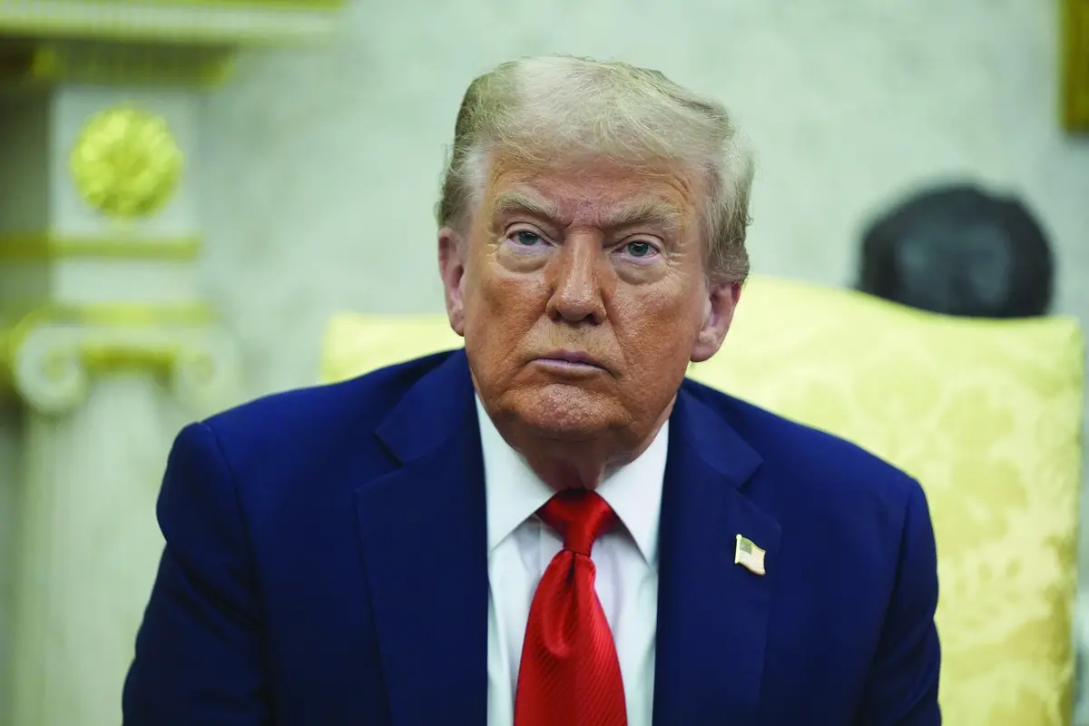 President Donald Trump listens during a meeting with Polish President Karol Nawrocki in the Oval Office of the White House, Wednesday, Sept. 3, 2025, in Washington. (AP Photo/Evan Vucci)