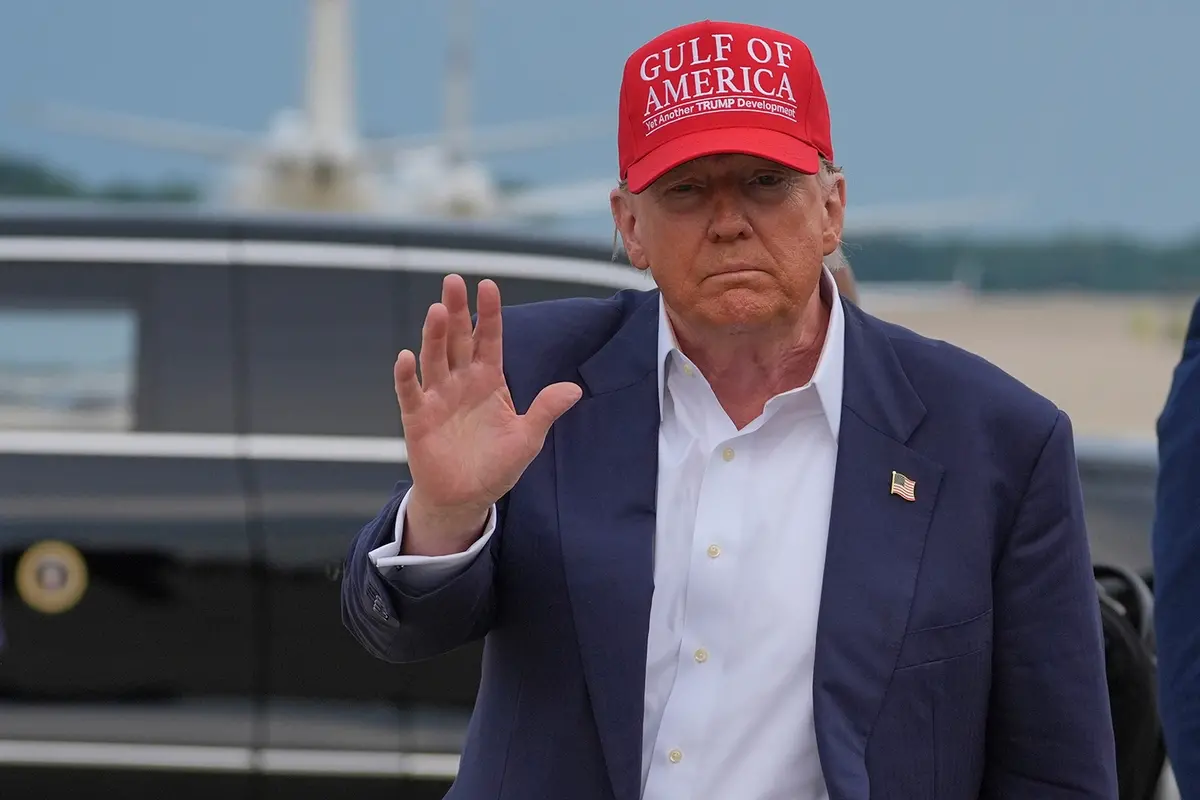 President Donald Trump waves as he arrives at Joint Base Andrews, Md., after visiting a migrant detention center in Ochopee, Fla., Tuesday, July 1, 2025. (AP Photo/Evan Vucci) , AP