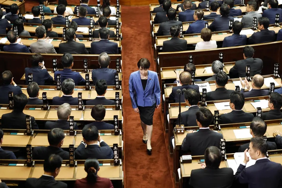 Sanae Takaichi, center, leader of the ruling Liberal Democratic Party, walks after voting for Japan\\'s new prime minister during the extraordinary session of the lower house in Tokyo Tuesday, Oct. 21, 2025. (Kyodo News via AP) , APN