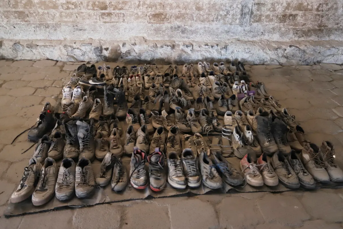 This photo released by the Jalisco State Attorney General\\\\\\'s Office shows shoes at the Izaguirre Ranch where skeletal remains were also discovered in the municipality of Teuchitlan, Mexico, Tuesday, March 11, 2025. (Jalisco State Attorney General\\\\\\'s Office via AP) , APN